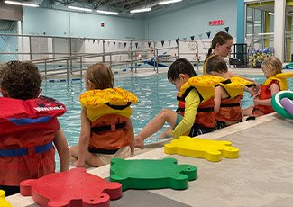 Kids at the Jack Burger Sports Complex pool